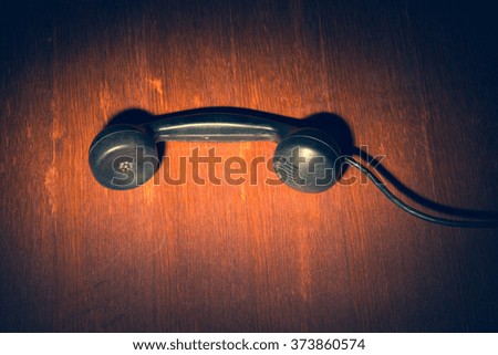 Black handset on the table