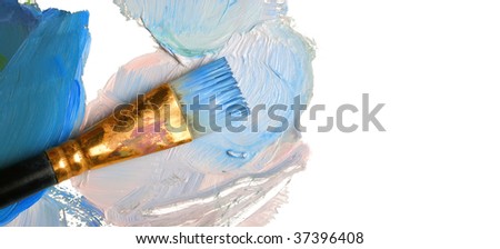 Paintbrush with blue paint, isolated on white background