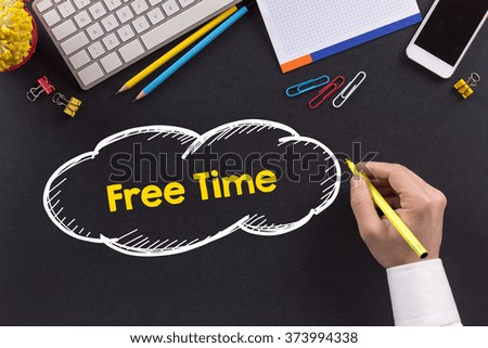 Man working on desk and writing Free Time
