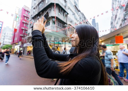 Woman take photo with cellphone