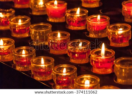 Row of Red prayer candles