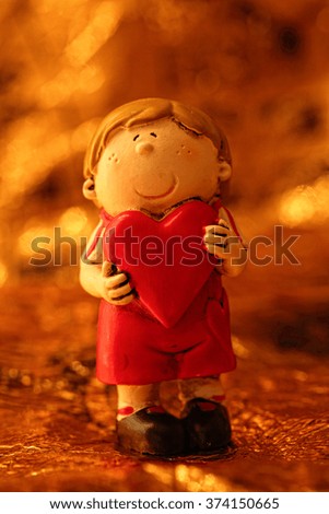 Statuette Cute  Boy holding heart