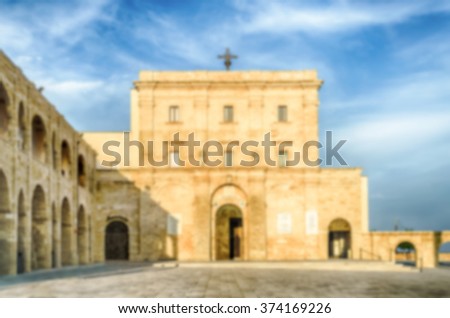 Defocused background with Sanctuary of Santa Maria di Leuca, in Salento, Apulia, Italy. Intentionally blurred post production for bokeh effect