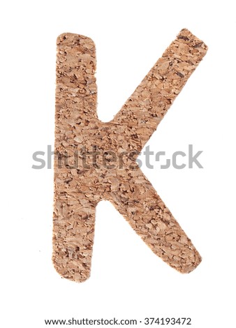 Cork board letter K isolated on white background