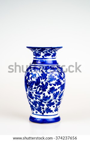 chinese antique vase on the plain back ground Royalty-Free Stock Photo #374237656