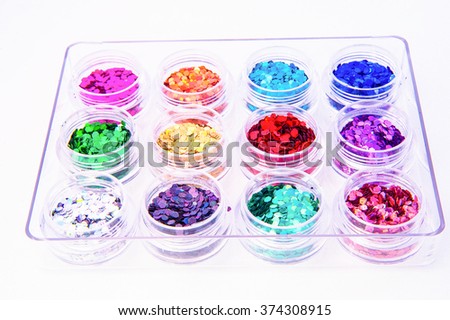 Picture of different kinds of nail glitters.