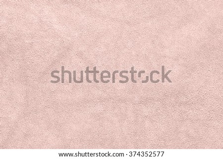 Natural light pink suede texture as background. Royalty-Free Stock Photo #374352577