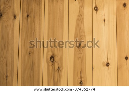 Plank wood logs on a wooden wall texture