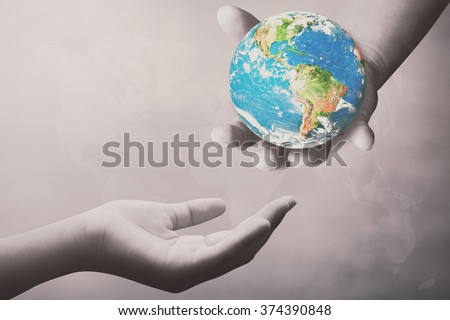 Hand for the opportunity and support. helping misery,wanting to help. Empty female open hand holding. The concept of aid. Open palm hand gesture of female hand:Elements of this image furnished by NASA