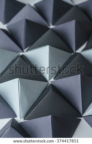Origami tetrahedrons background. Futuristic polygonal composition is great for using in web.