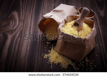 Millet in paper bags. Selective focus