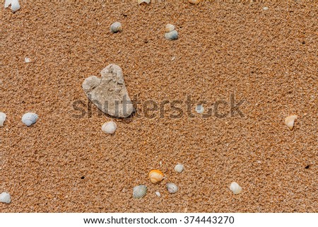Heart Stone on the Sand