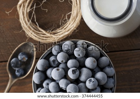 Photo of frozen blueberry in metal mug