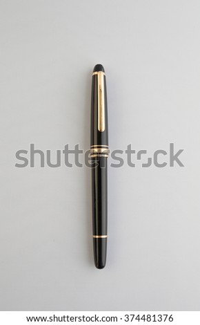 Fountain pen on a light background - vertical 