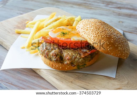 burger and fires with tomato and cheese look yummy
