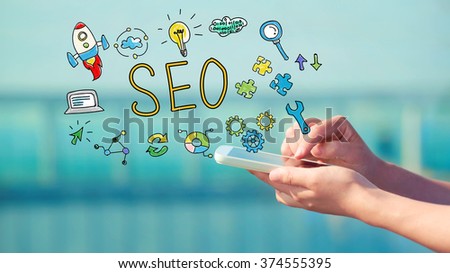 SEO concept with person holding a smartphone 
