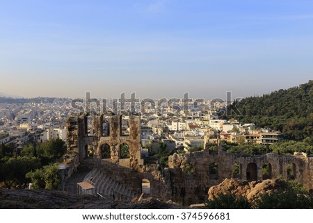 Ancient theatre under Acropolis of Athens and view of city, Greece