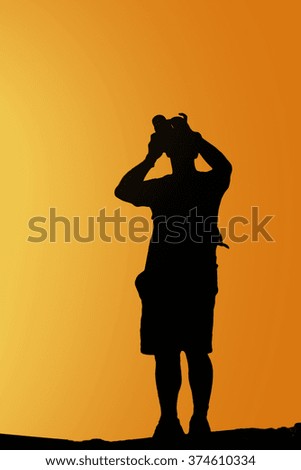 Silhouette of  photographer 