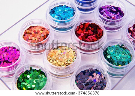 Picture of different kinds of nail glitters.