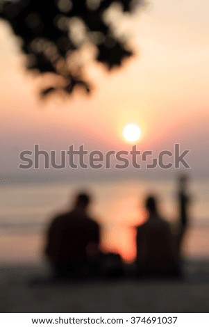 Blurred soft young couple in love at beach for background