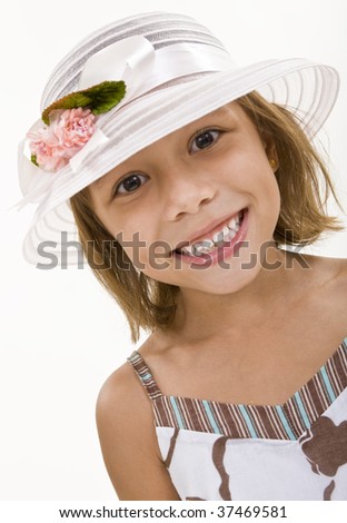 A Cute Young Girl Wearing a Bonnet
