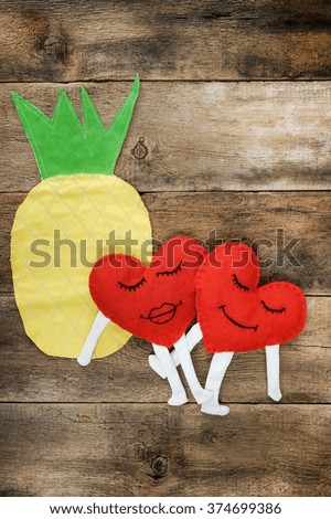 A happy couple in love with  smiles over wooden background. Valentines day background