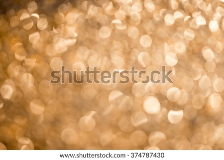 abstract background gold bokeh circles for Holiday background  with bokeh defocused lights