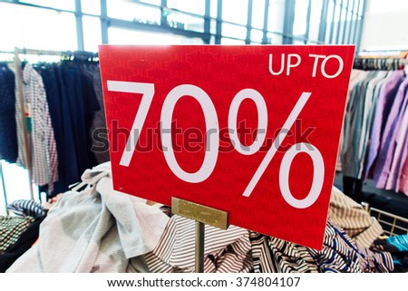 discount sign in clothing store