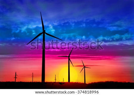 Picture of modern production of electricity - a powerful wind turbines in the background of beautiful nature