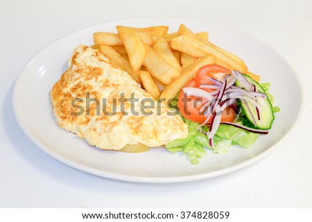 Omelette meal with chips and salad