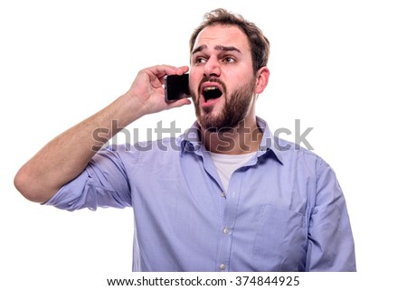 Cheerful man with beard singing with his cell phone to his ear