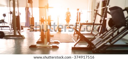Blurred of fitness gym background for banner presentation. Royalty-Free Stock Photo #374917516