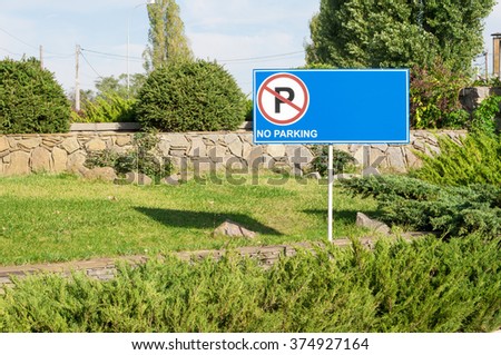 road sign "no Parking" in green parkland