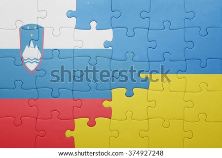 puzzle with the national flag of ukraine and slovenia . concept
