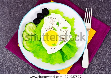 Scrambled Eggs with Chia Seeds, Lettuce and Cucumber Studio Photo