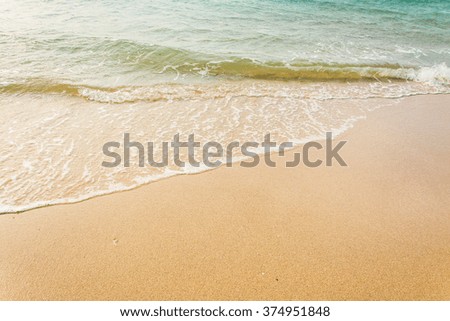 Wave of the sea on the sand beach , for background