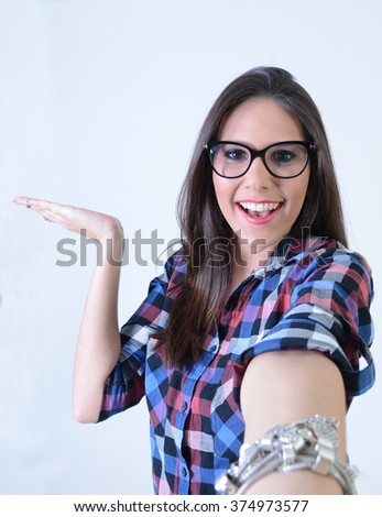 Woman taking selfie on white background.