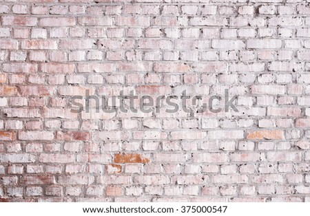 background - old brick wall with red white painted bricks