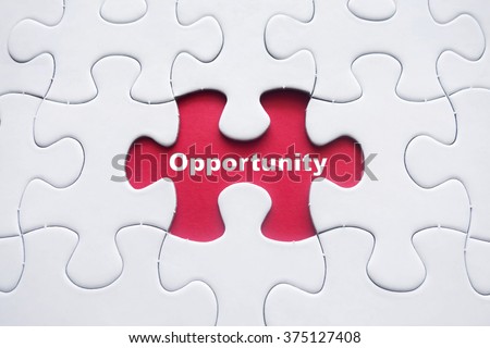 Missing puzzle with Opportunity word Royalty-Free Stock Photo #375127408