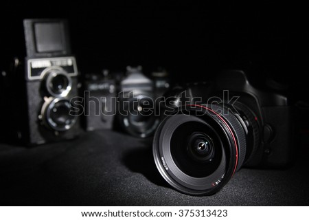 Generations cameras. Digital and film. Royalty-Free Stock Photo #375313423