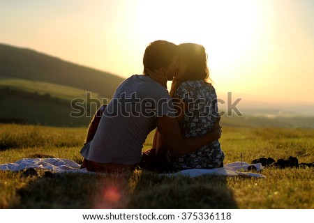 Cuddling couple. Couple in love. Love couple. Love hug. Love kiss. Couple kiss Royalty-Free Stock Photo #375336118