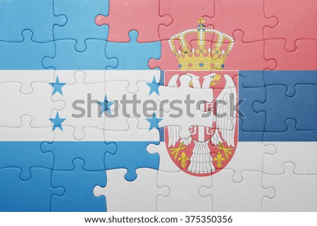 puzzle with the national flag of honduras and serbia . concept