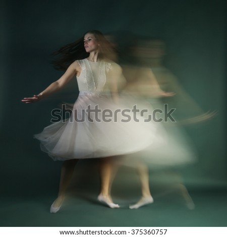 Ballet dancer woman in motion blur, beautiful ballerina