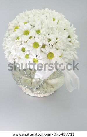 Daisies with the glass bowl