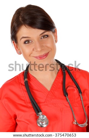 Beautiful happy female doctor wearing red lab coat posing on isolated background