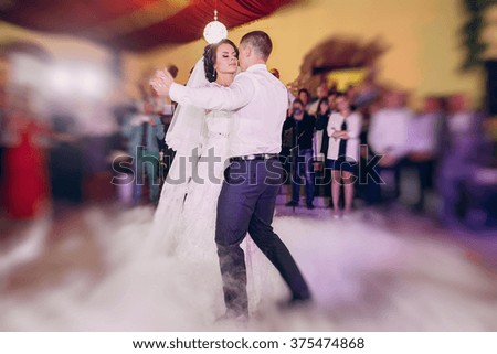 first wedding dance of a young couple in the restaurant