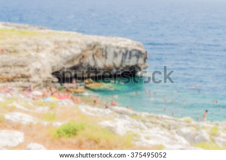 Defocused background with beautiful seascape in Salento, Apulia, Italy. Intentionally blurred post production for bokeh effect