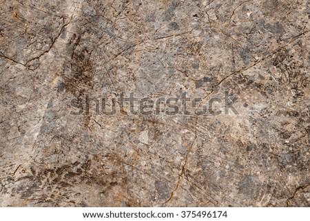 The surface of natural stone used as a background.