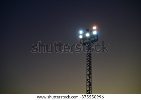 sportlights tower with background twilight