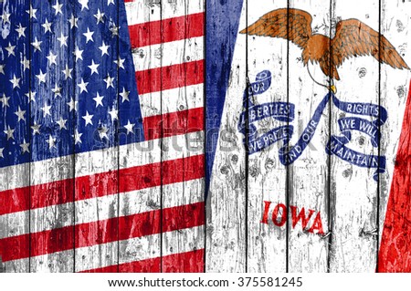 Flag of US and Iowa painted on wooden frame